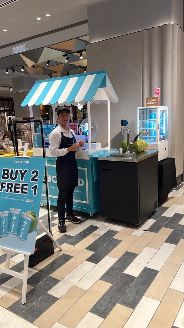 Cocopod branded kiosk in a mall